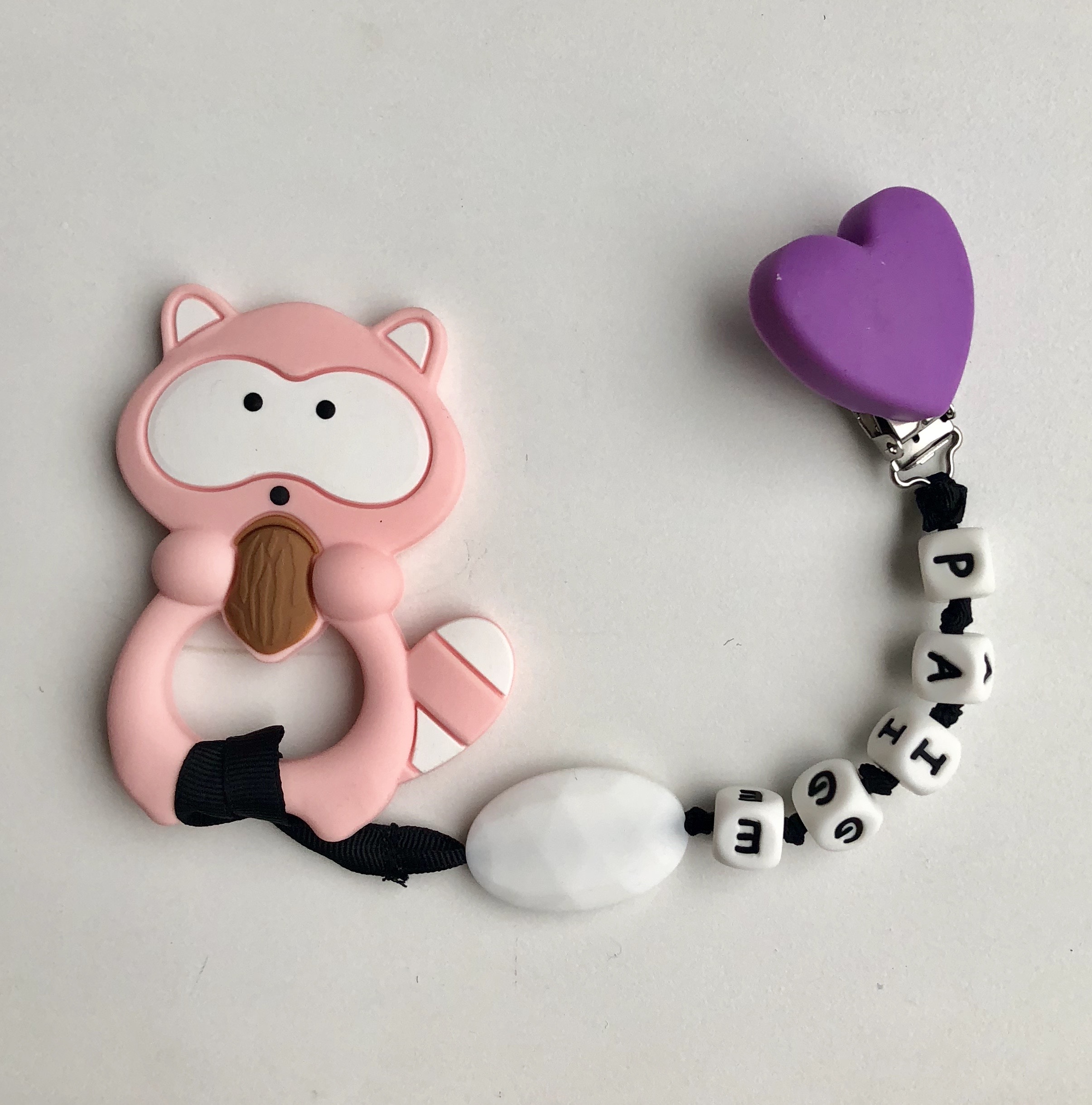 personalized pink raccoon teething clip