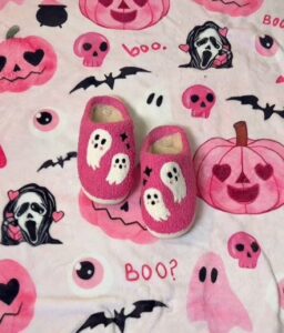 The Ultimate Halloween Must-Haves for 2025: Spooky & Cozy Décor Ideas 5 Cozy fuzzy ghost slippers in pink, perfect for spooky season